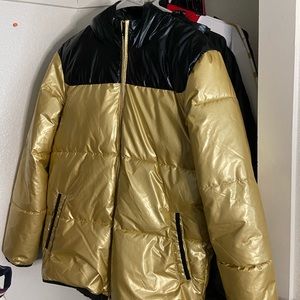 Puffer gold jacket open for offers